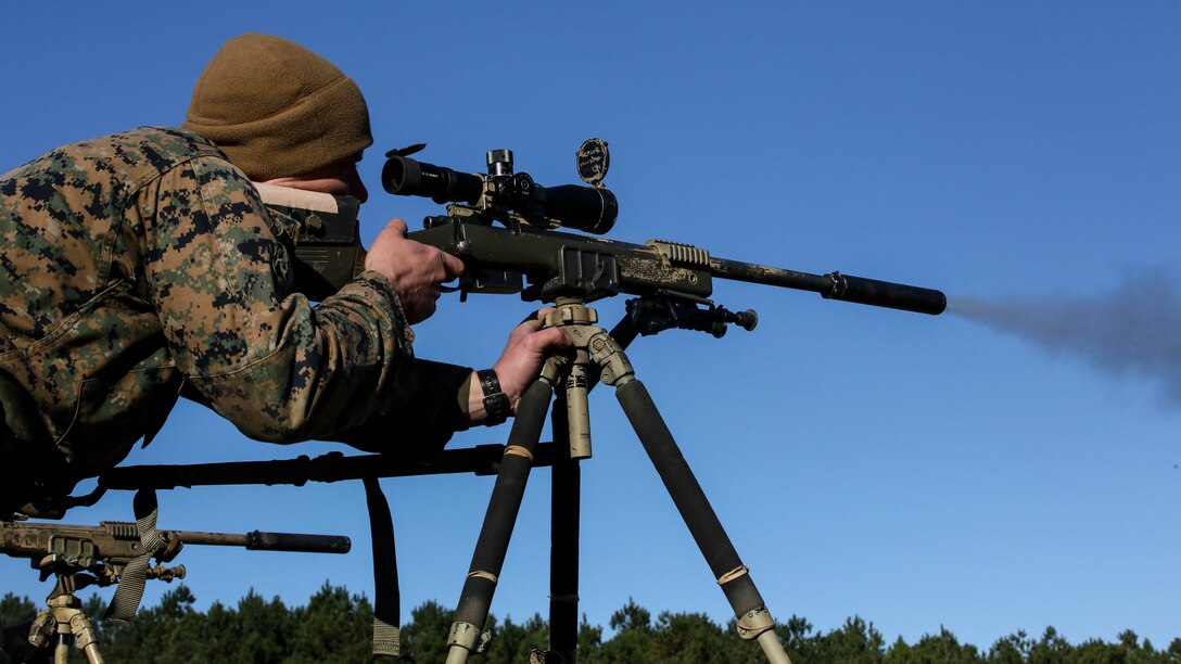 A Marine student undergoing the 2nd Marine Division Combat Skills Center Pre-Scout Sniper Course, fires on a target with the M40A5 sniper rifle at Marine Corps Base Camp Lejeune, North Carolina, Jan. 12, 2016. The three-week course is designed to prepare qualified Marines for the Scout Sniper Basic Course, and instructs them in skills such as stalking, camouflage, land navigation and marksmanship. 