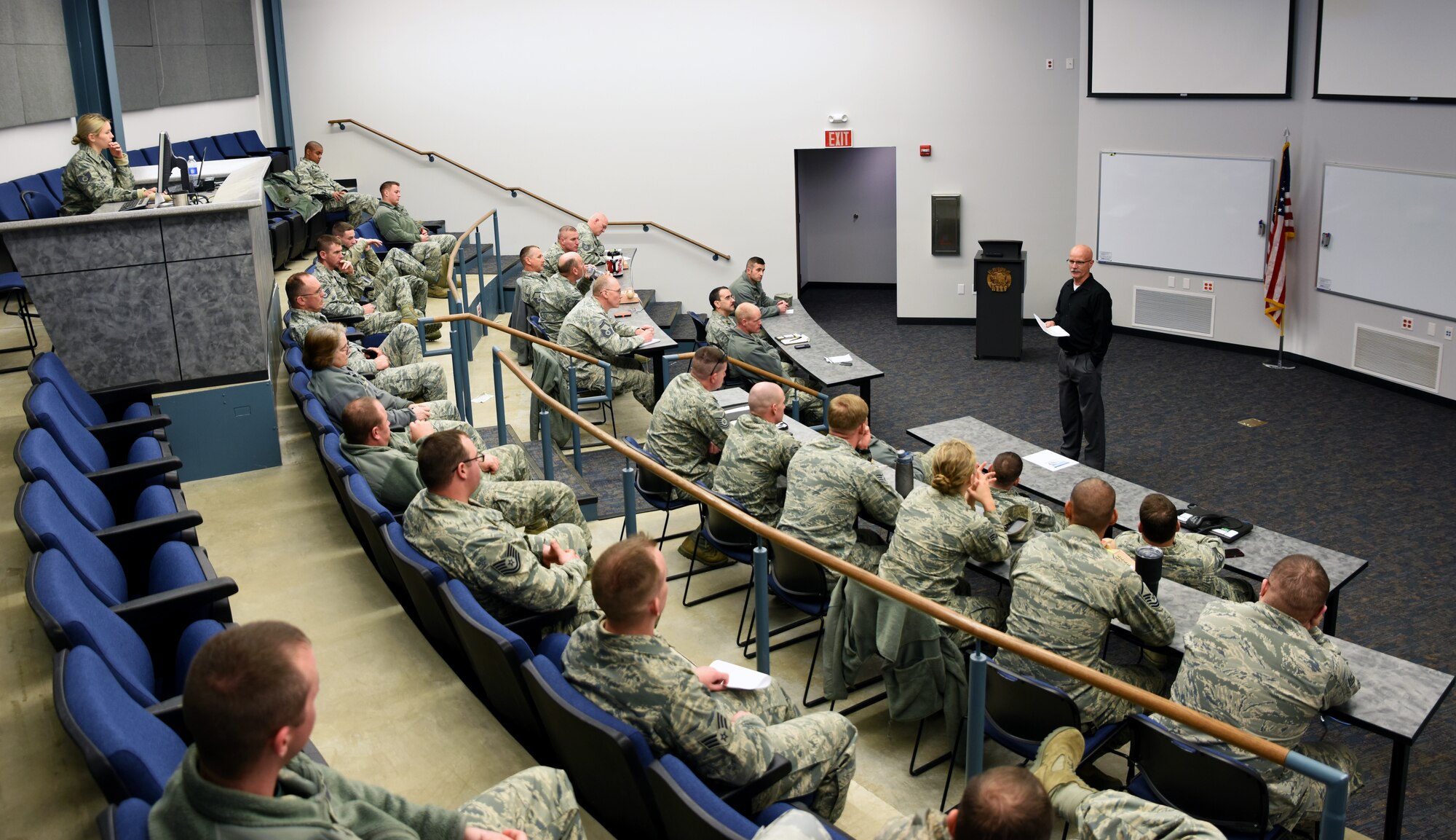 Mark McDaniel, Arkansas Yellow Ribbon Reintegration Program coordinator, speaks to members of the 188th Wing Jan. 10, 2016, about the YRRP at Ebbing Air National Guard Base, Fort Smith, Ark. The YRRP’s mission is to assist, collaborate and partner with the Armed Services at the lowest level possible in order to provide service members, veterans and their family members with informational events and activities, referrals and proactive outreach services throughout the phases of deployment or mobilization. (U.S. Air National Guard photo by Senior Airman Cody Martin/Released)