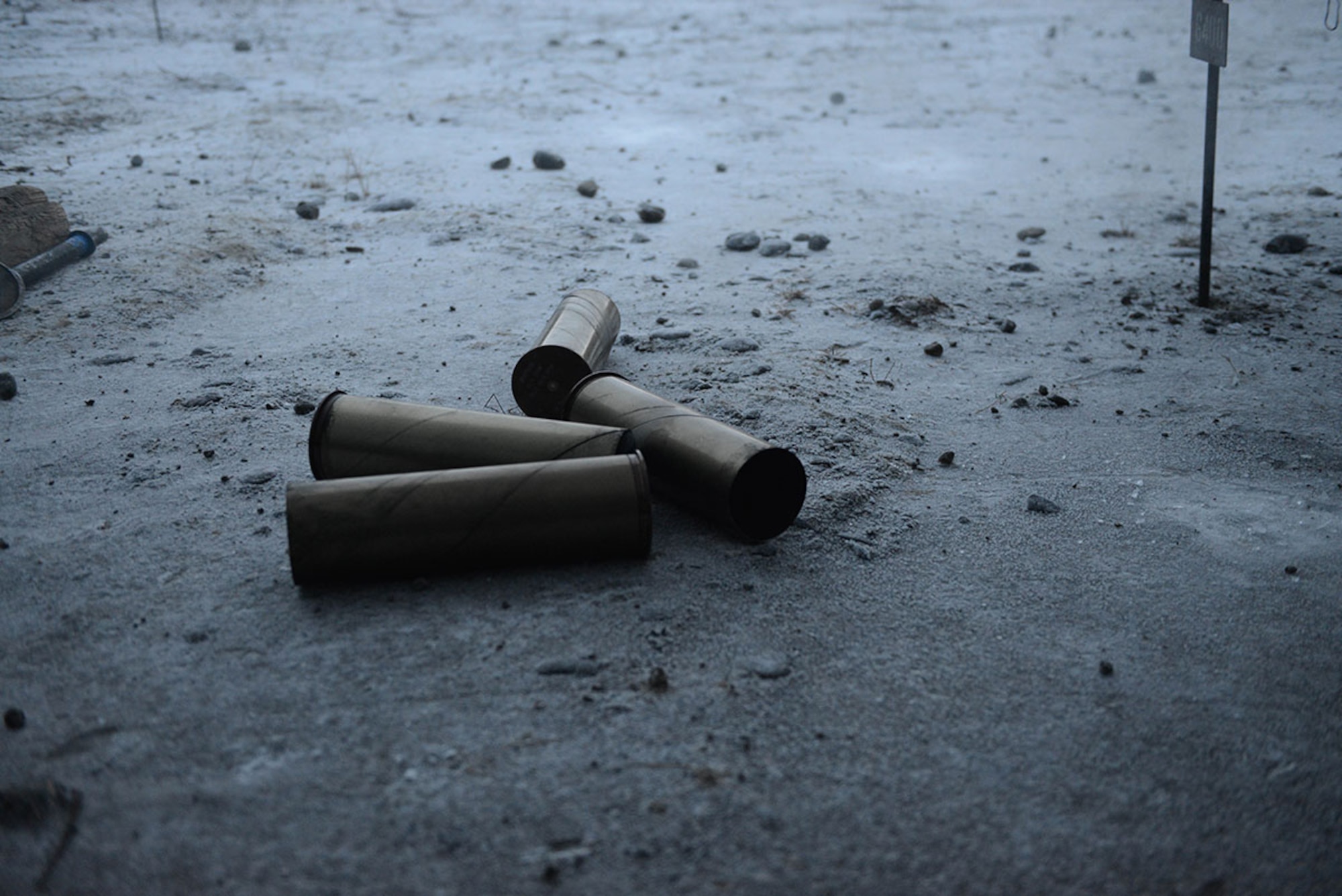 Shells expelled from an M119A2 105mm howitzer rest after a live fire mission on Joint Base Elmendorf-Richardson, Alaska, Monday, Jan. 11, 2016. The weapon can be transported via helicopter, towed by vehicle, or heavy-dropped from an aircraft. (U.S. Air Force photo/Airman 1st Class Javier Alvarez)