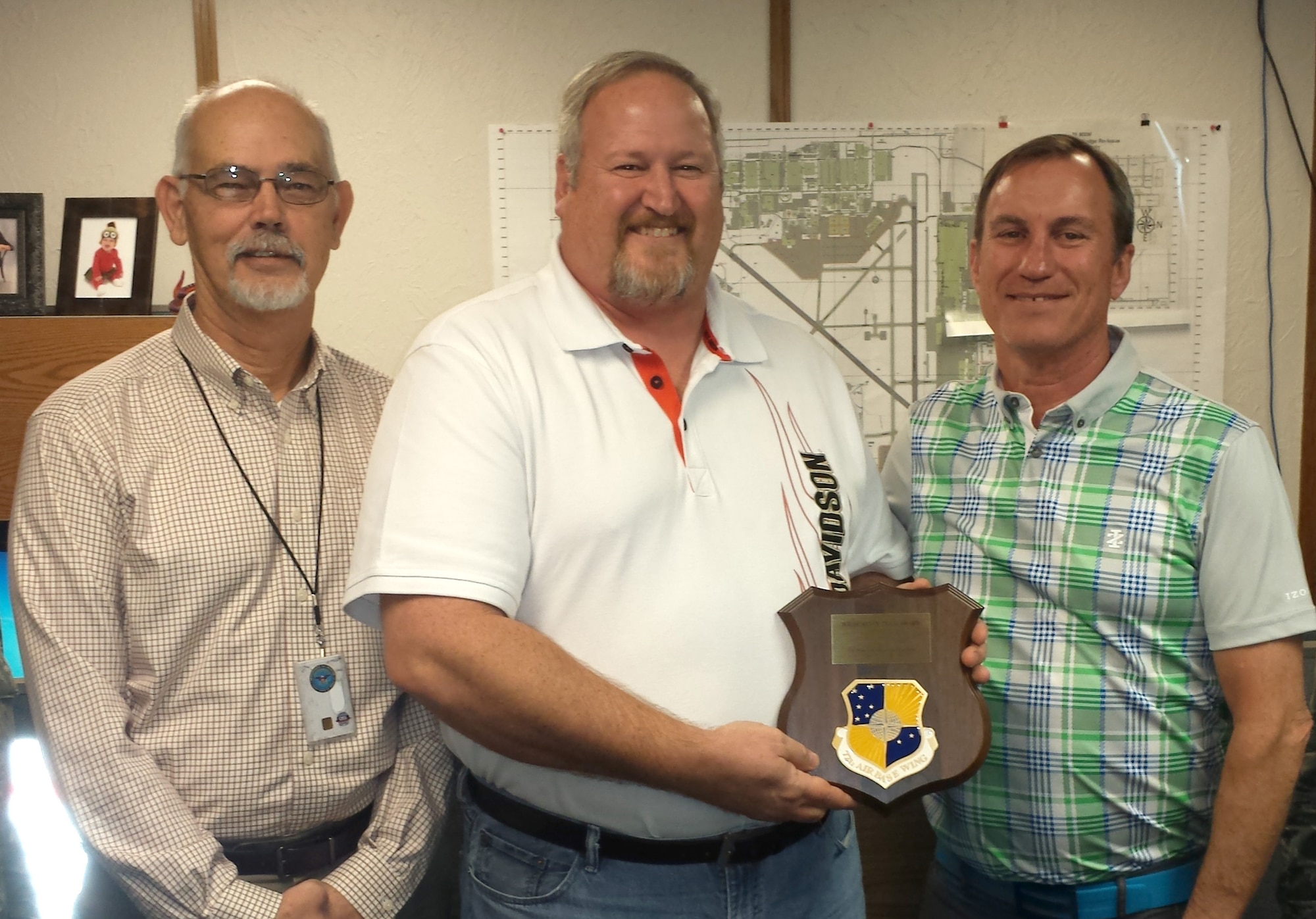 The team of Jonny Conover, Scott Lindsey and Paul Logan was recently honored with a 72nd Air Base Wing Wildcatter Award.(Courtesy photo)