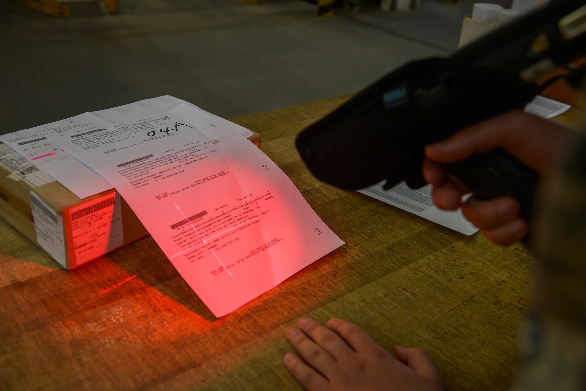 Airman 1st Class Sean Henderson, 374th Logistics Readiness Squadron materiel management flight central storage technician, scans a spare part before placing it into a storage section at Yokota Air Base, Japan, Jan. 11, 2016. The flight manages supplies and equipment providing logistical support to 28 units and 18 assigned aircraft. (U.S. Air Force photo by Senior Airman David Owsianka/Released)
