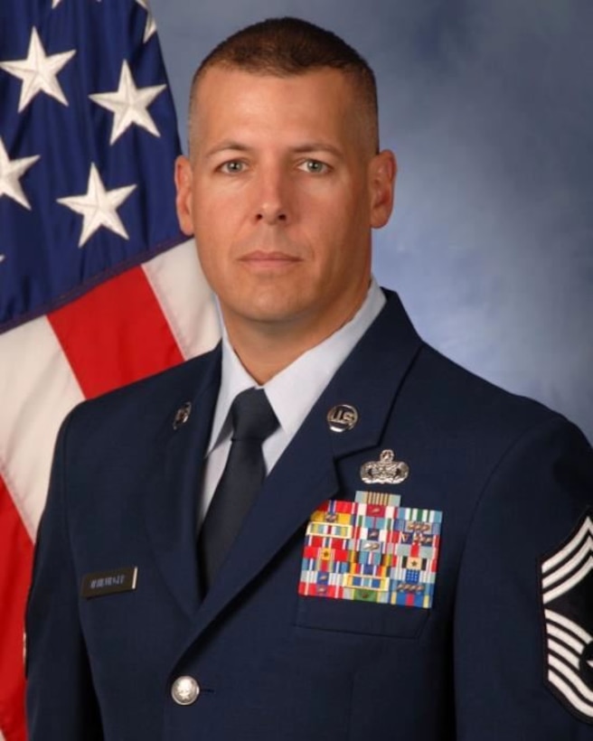Chief Master Sgt. Christopher J. VanBurger assumes his new position as the 15th Air Force Office of Special Investigations Command Chief on Feb. 15, 2016. (Official U. S. Air Force photo)