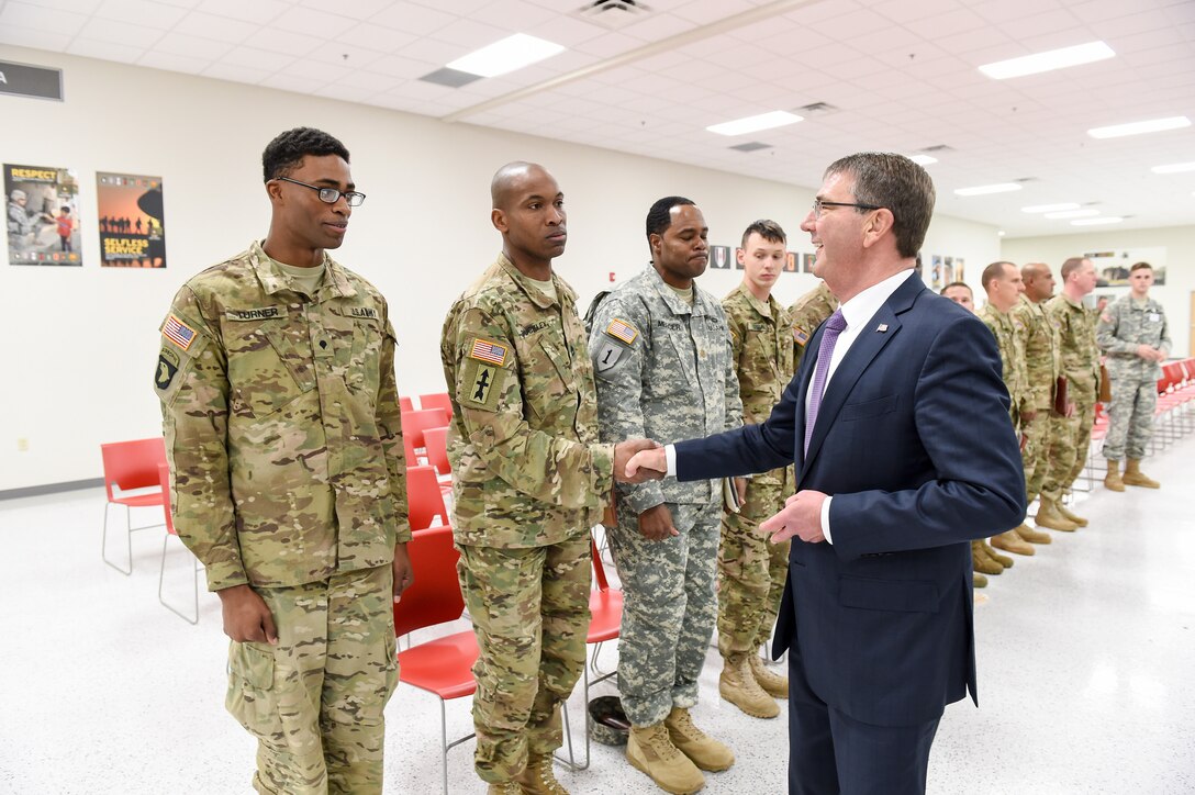 Defense Secretary Ash Carter shakes hands with a soldier in a troop line at the Soldier Readiness Processing and Family Assistance Center on Fort Campbell, Ky., Jan. 13, 2016. DoD photo by Army Sgt. 1st Class Clydell Kinchen