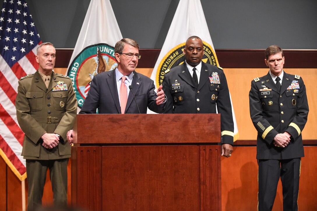 Defense Secretary Ash Carter conducts a news conference on MacDill Air Force Base in Tampa, Fla., Jan. 14, 2016. The secretary is flanked by Marine Corps Gen. Joseph F. Dunford Jr., chairman of the Joint Chiefs of Staff, left, and Army Gen. Lloyd J. Austin III, commander of U.S. Central Command.  DoD photo by Army Sgt. 1st Class Clydell Kinchen