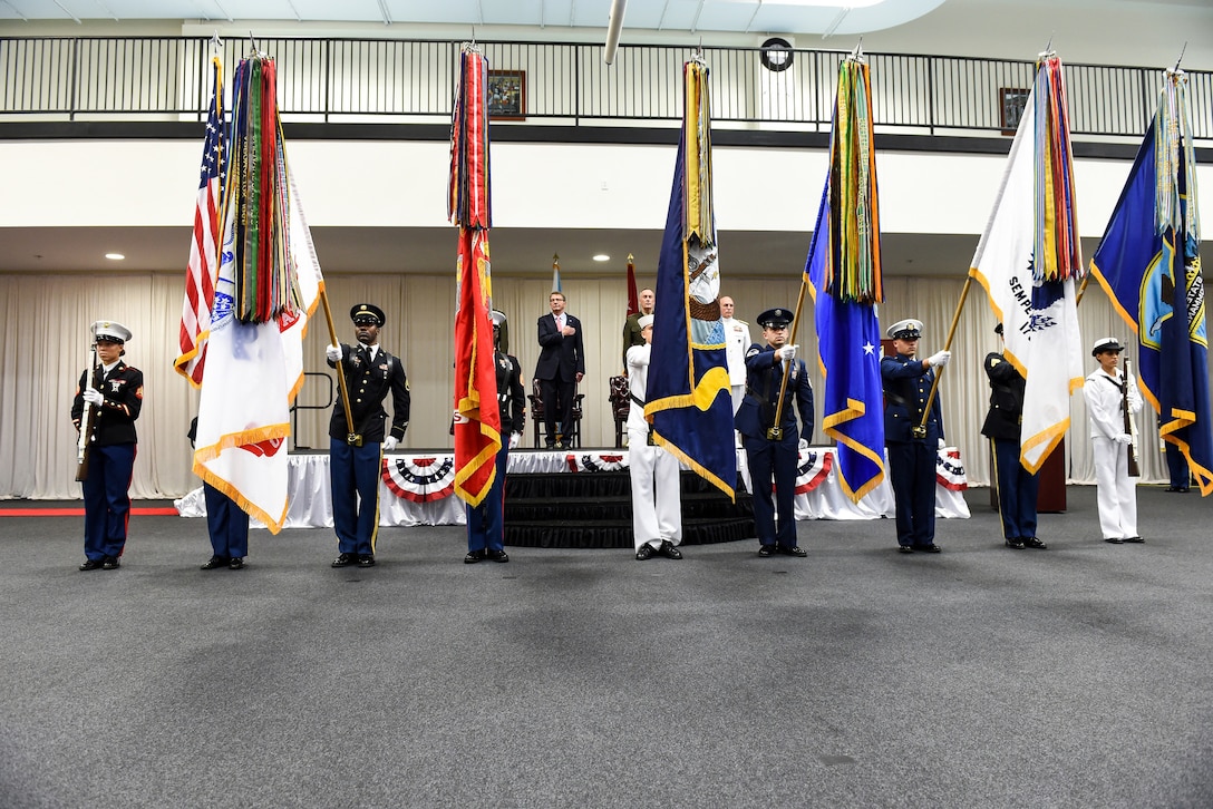 Defense Secretary Ash Carter, Marine Corps Gen. Joseph F. Dunford, chairman, Joint Chiefs of Staff,  Marine Corps Gen. John F. Kelly and Navy Adm. Kurt W. Tidd, render honors during U.S. Southern Command's change of command on MacDill Air Force Base, Jan. 14, 2016. DoD photo by Army Sgt. 1st Class Clydell Kinchen