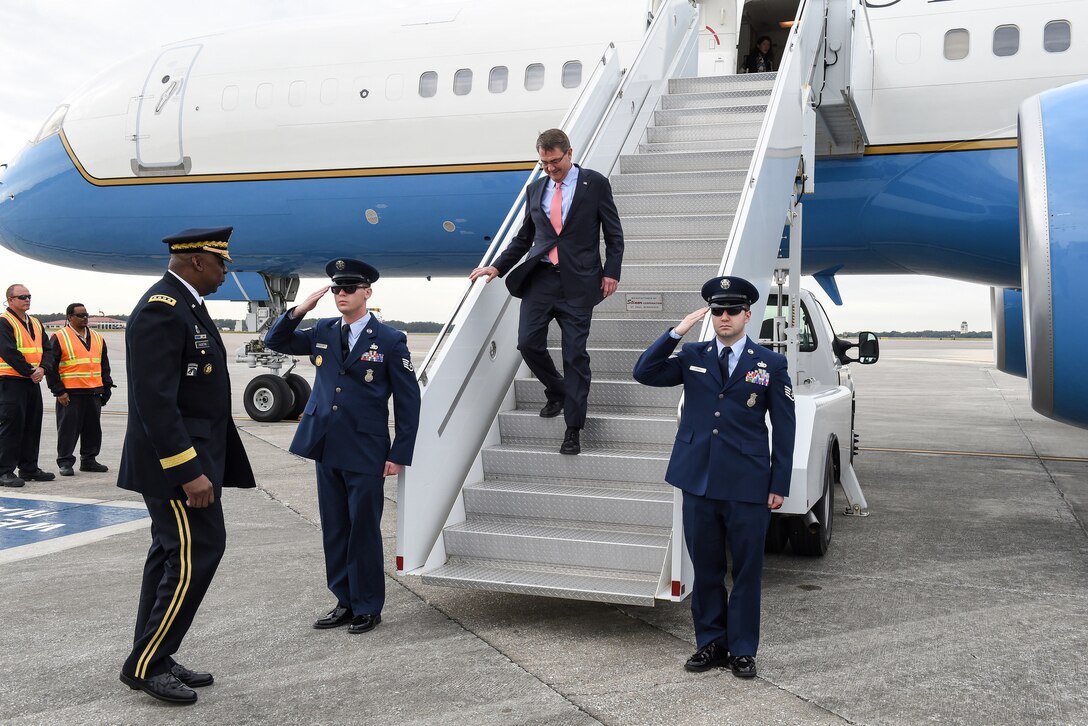 Defense Secretary Ash Carter is met by Army Gen. Lloyd J. Austin III, commander of U.S. Central Command, after arriving on MacDill Air Force Base, Jan. 14, 2016. DoD photo by Army Sgt. 1st Class Clydell Kinchen