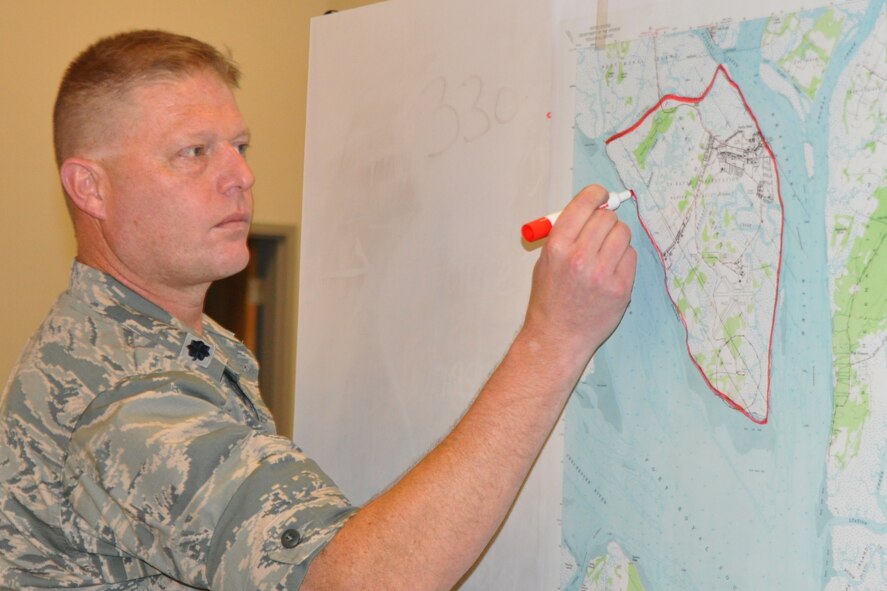 U.S. Air Force Reserve Lt. Col. Karl Haagsma, an entomologist assigned to the 910th Airlift Wing’s Aerial Spray Unit, leads an aerial spray mapping exercise during the Department of Defense (DoD) Aerial Spray Certification Course at the Lee County Mosquito Control District Training Center here, Jan. 11, 2016. The four-day course is a certification requirement for pest management specialists involved in the aerial spraying of products designed to destroy disease-carrying insects. Youngstown Air Reserve Station’s 910th Airlift Wing is home to DoD’s only aerial spray mission and the wing’s Citizen Airmen brought their unique knowledge to the course for the benefit of those participating in the event. (U.S. Air Force photo/Master Sgt. Bob Barko Jr.)