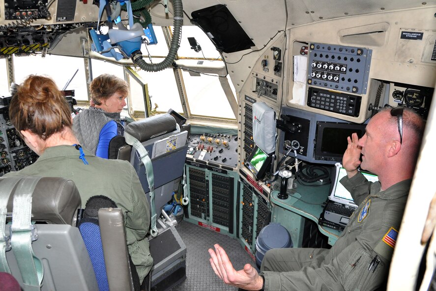 Lt. Jeff Shaffer (right), an aerial-spray qualified navigator assigned to the 910th Airlift Wing’s aerial spray team, talks with participants of the Department of Defense Aerial Spray Certification Course on the flight deck of one of the wing’s aerial spray modified C-130 aircraft on the flightline at Page Field here, Jan. 12, 2016. The static display of the aircraft and aerial spray equipment was part of the four-day course, which is a certification requirement for pest management specialists involved in the aerial spraying of products designed to destroy disease-carrying creatures. (U.S. Air Force photo/Master Sgt. Bob Barko Jr.)