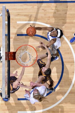 U.S. Air Force Academy forward Dee Bennett, a sophomore, drives in for a layup as the Air Force Academy Falcons met the Wyoming Cowgirls at Clune Arena in Colorado Springs, Colo., Jan. 6, 2016. The Falcons started off strong, but fell to Wyoming 67-45 in the Mountain West Conference contest. Bennett finished the night with 4 points and 7 rebounds. (U.S. Air Force photo/Jason Gutierrez)