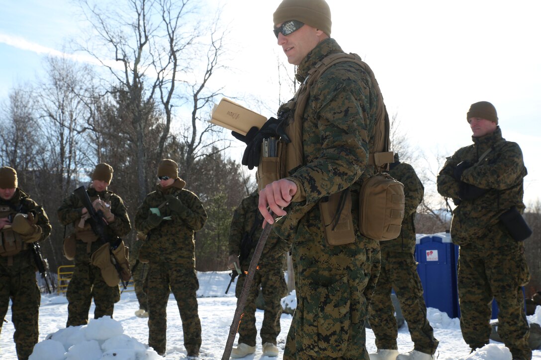 First Lt. Michael T. O’Neill, a platoon commander with Company A, 1st Battalion, 25th Marines, 4th Marine Division, Marine Forces Reserve , gives an overview of the patrol to his team during training exercise Nordic Frost,  Jan. 8, 2016, at Ethan Allen Training Center in Jericho, Vt. The patrol consisted of heavy machine gun suppressive fire as a team of Marines advanced under the tree line to assault a simulated enemy bunker. 