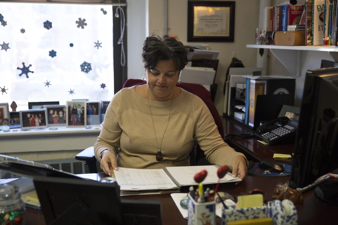 Hope Fiorvanti, deputy protocol officer, evaluates the details for an upcoming event at Marine Barracks Washington, D.C., Jan. 13, 2016. The protocol office is responsible for arranging details required to support the Barracks’ hosting missions and ensuring events are conducted with the upmost professionalism, precision and timeliness. (Official Marine Corps photos by Cpl. Chi Nguyen/Released)