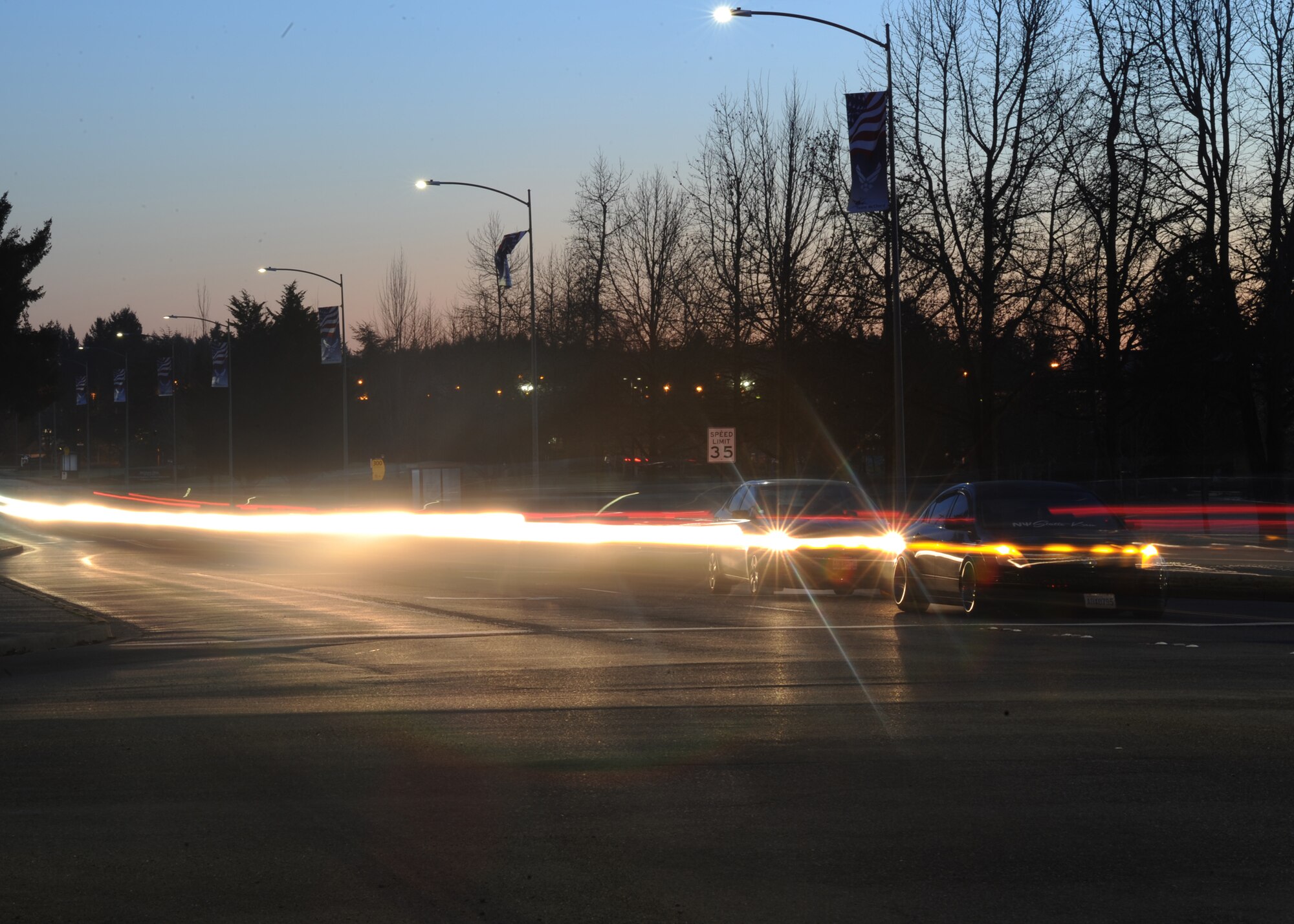 Traffic flows through the intersection of Col. Joe Jackson Blvd. and Barnes Blvd. Jan. 10, 2016 at Joint Base Lewis-McChord, Washington. Freezing weather and fast speeds make for treacherous on- and off-base driving conditions. Base personnel can minimize risks of driving in inclement weather by slowing down, and knowing the current weather conditions. (U.S. Air Force Reserve photo by Tech. Sgt. Bryan Hull)
