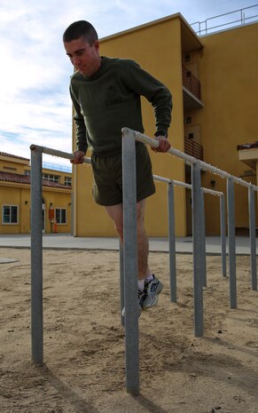 Lance Cpl. Matthew P. Chaves, Kilo Company, 3rd Recruit Training Battalion, executes dips during a physical fitness session at Marine Corps Recruit Depot San Diego, Jan. 11. After graduation, Chaves will be attending the School of Infantry in Camp Pendleton, Calif., where he will pursue his military occupational specialty as an infantryman. Today, all males recruited from west of the Mississippi are trained at MCRD San Diego. The depot is responsible for training more than 16,000 recruits annually. Kilo Company is scheduled to graduate Jan. 15.