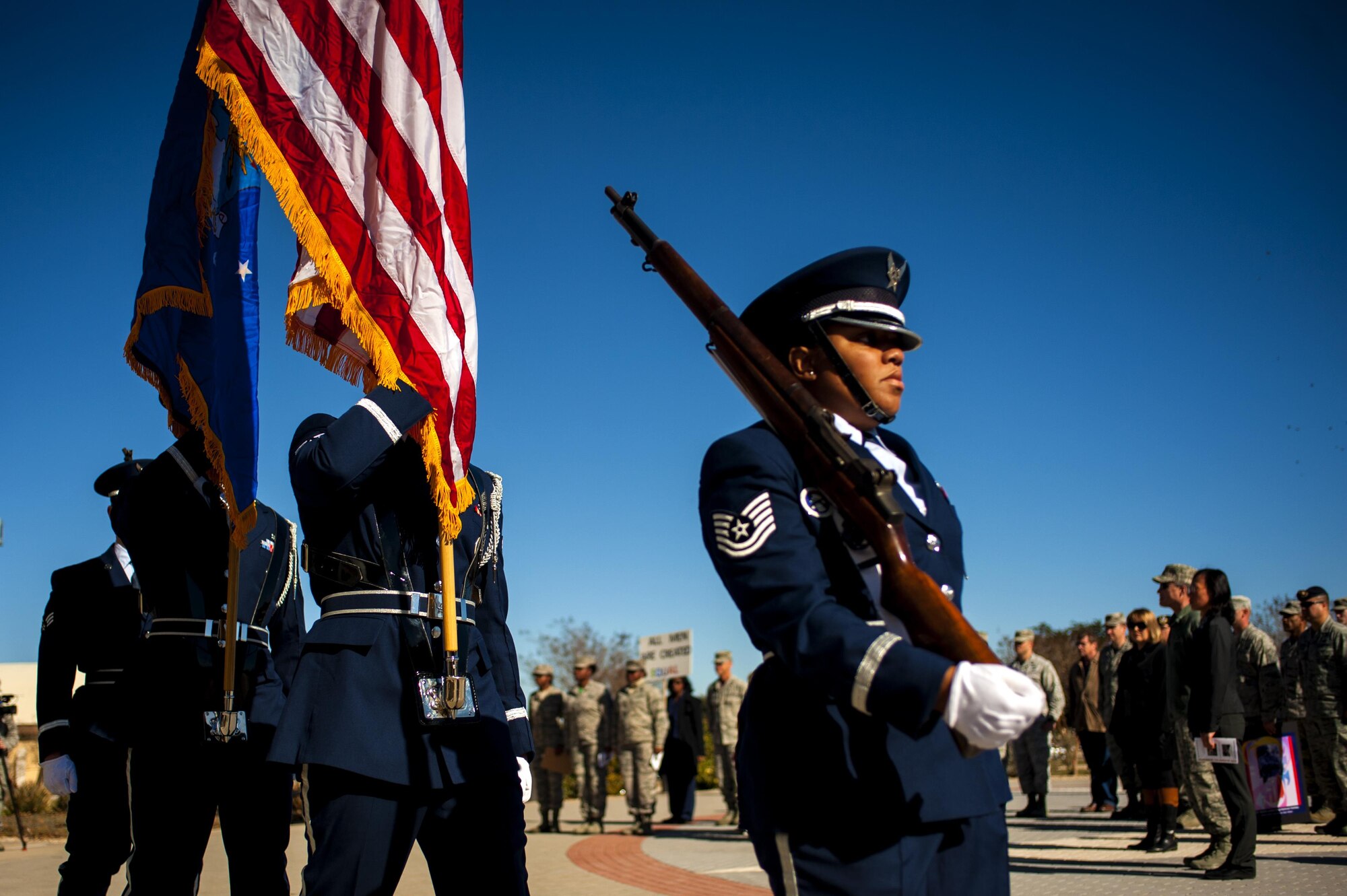 Goodfellow Honor Guard marches after displaying the colors for the opening ceremony of March on Goodfellow at the Norma Brown building on Goodfellow Air Force Base, Texas, Jan. 15, 2016. The event commemorated the marches Martin Luther King Jr. and his supporters led during the civil rights movement. (U.S. Air Force photo by Senior Airman Scott Jackson/Released)