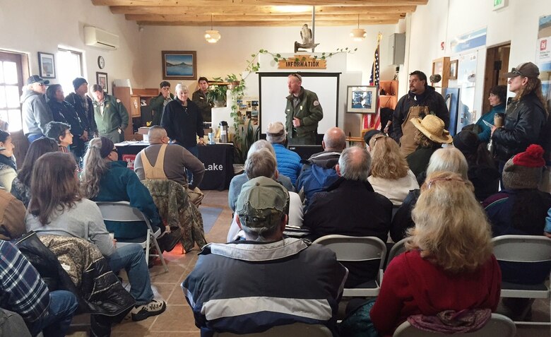 ABIQUIU LAKE, N.M. – Lead Park Ranger Austin Kuhlman speaks to volunteers before they head out to count eagles, Jan. 9, 2016. 