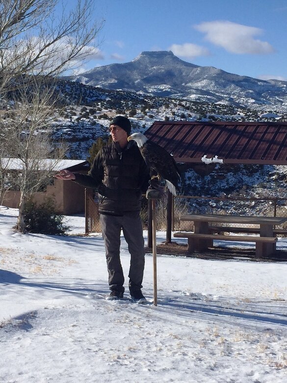 ABIQUIU LAKE, N.M. -- Scott Bol, volunteer with the New Mexico Wildlife Center, displays the center’s captive non-releasable bald eagle to volunteers before they begin counting wild eagles around the lake, Jan. 9, 2016.  
