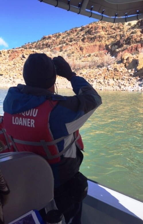 ABIQUIU LAKE, N.M. – A volunteer looks for eagles on the lake, Jan. 9, 2016. 