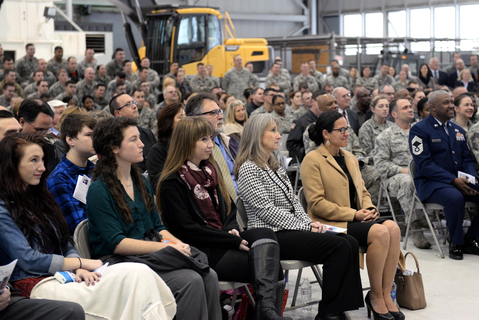 Col. Mark Slocum, 4th Fighter Wing commander, addresses the audience of Chief Master Sgt. Jeffrey Craver, 4th Fighter Wing command chief, during Craver’s retirement ceremony, Jan. 15, 2016, at Seymour Johnson Air Force Base, North Carolina. Craver served in the Air Force for 30 years, traveling all over the world including Italy, Japan and Germany. (U.S. Air Force photo/Airman 1st Class Ashley Williamson)