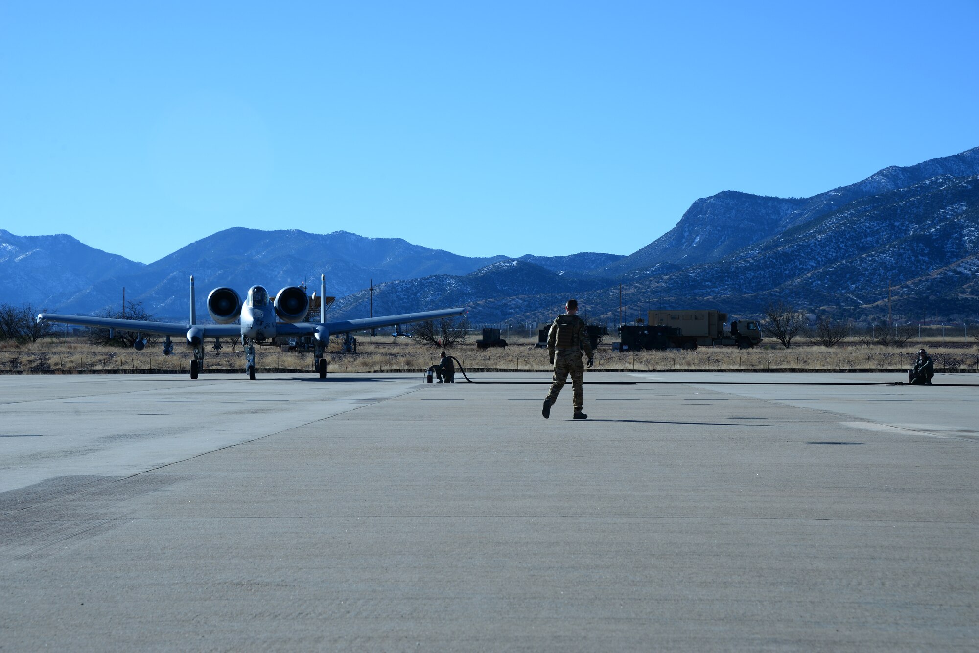 U.S. Airmen assigned to the 355th Logistics Readiness Squadron refuel an A-10 Thunderbolt II assigned to the 354th Fighter Squadron, from Davis-Monthan Air Force Base, Ariz., during Forward Area Refueling Point training at Fort Huachuca, Ariz., Jan. 13, 2016. The FARP training was part of Cactus Flag: a large force employment exercise. (U.S. Air Force photo by Airman 1st Class Mya M. Crosby/Released)