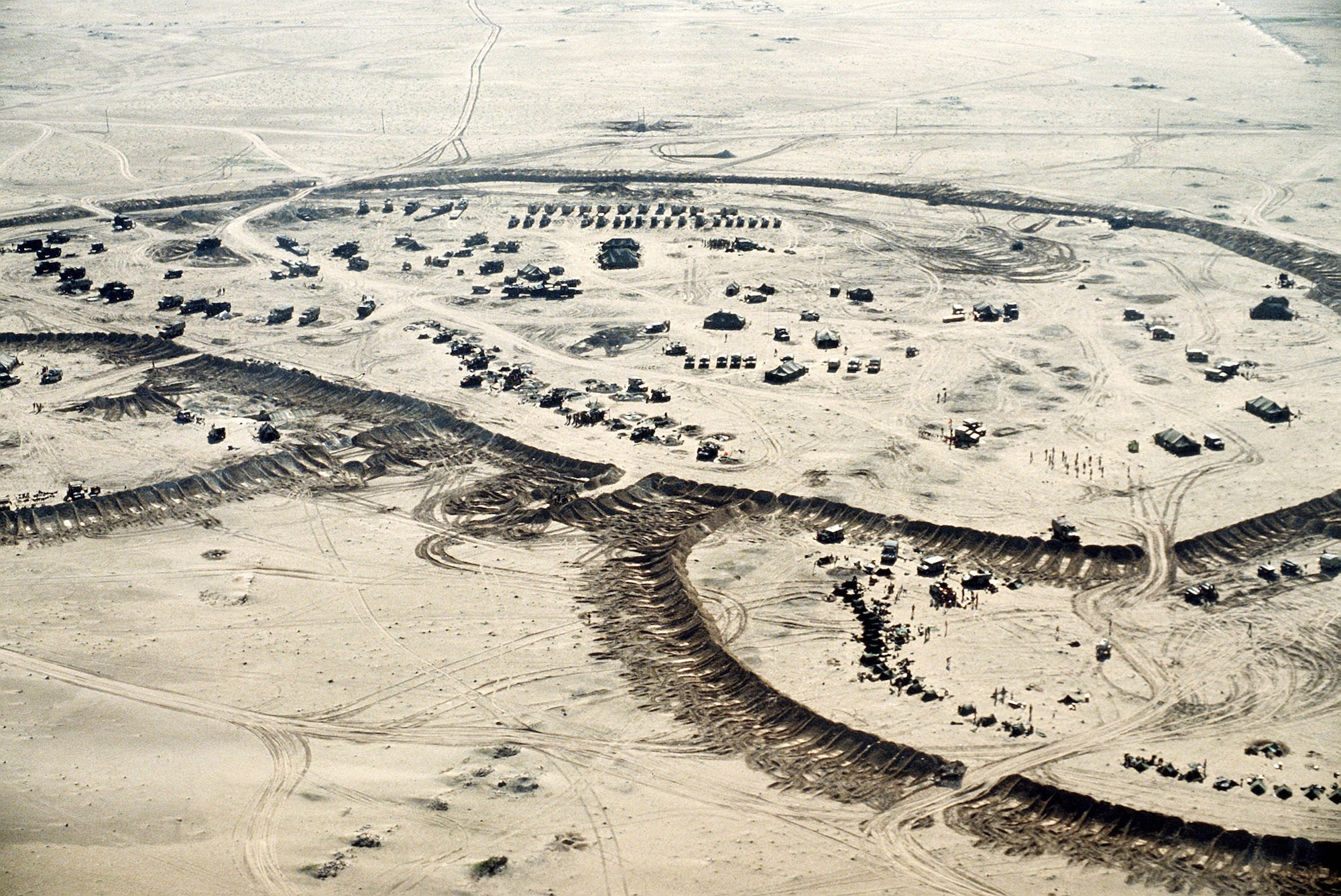 An aerial view of an Allied military encampment during Operation Desert Storm. Over 670,000 troops from 28 countries supported this phase of the Persian Gulf War, making it the largest air campaign since the conflict in Southeast Asia. (U.S. Air Force Courtesy Photo)