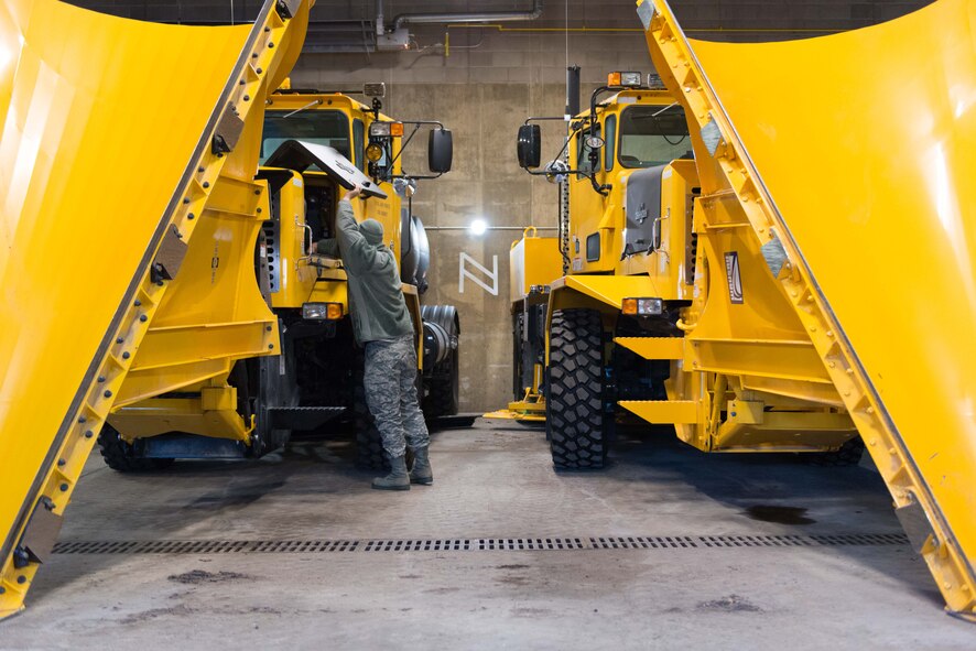 Tech. Sgt. Adam Ruter, 934th Civil Engineer Squadron technician, performs an equipment check on an OshKosh rollover plow inside the Vehicle Operations bay at the Minneapolis-St. Paul Air Reserve Station on Jan. 10  (U.S. Air Force Photo by Staff Sgt. Trevor Saylor))
