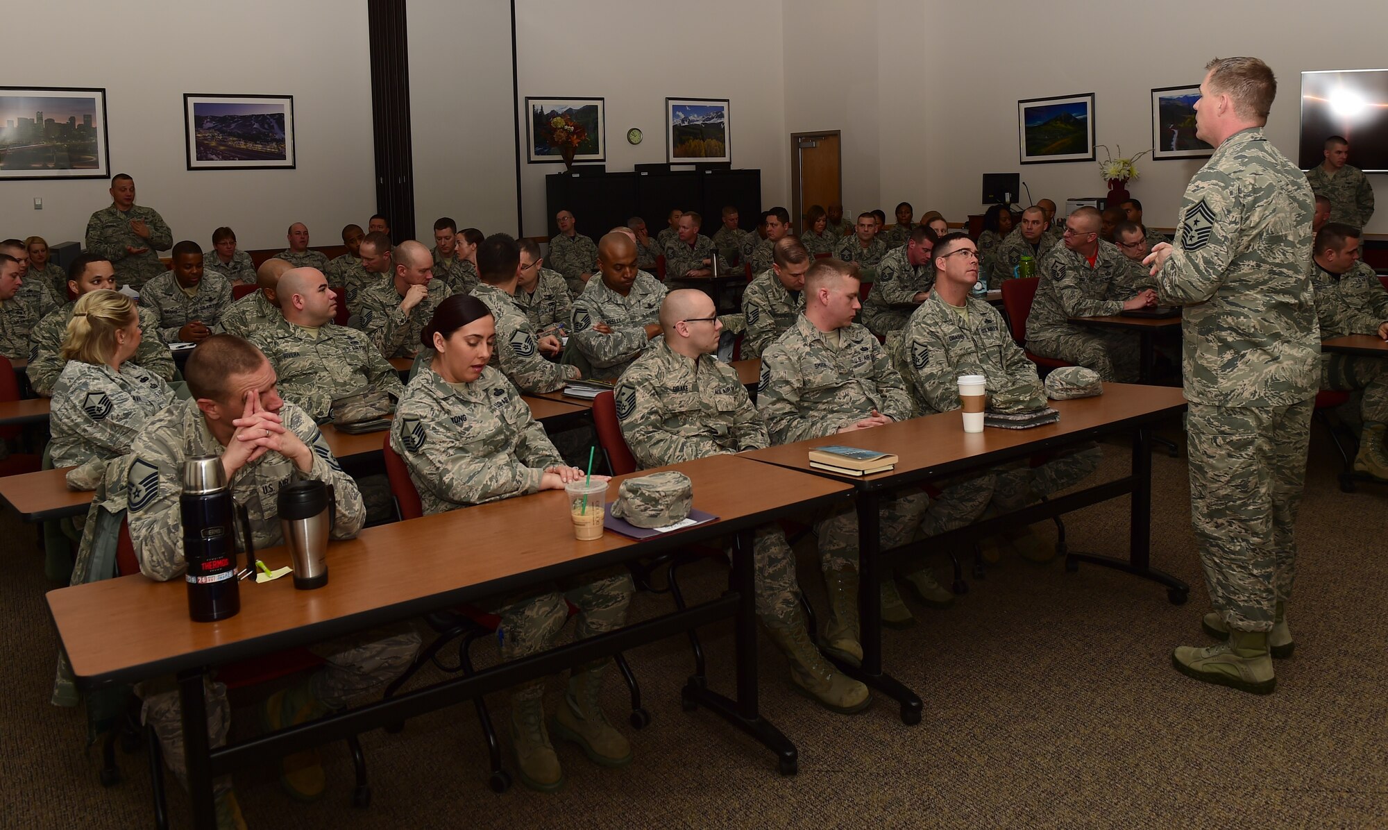 Chief Master Sgt. Craig A. Neri, Command Chief Master Sergeant, 14th Air Force (Air Forces Strategic), Air Force Space Command; and Command Senior Enlisted Leader, Joint Functional Component Command for Space, U.S. Strategic Command, answers questions at a senior NCO call Jan. 15, 2016, at Buckley Air Force Base, Colo. Neri visited Buckley with Lt. Gen. David J. Buck, Commander, 14th Air Force (Air Forces Strategic), Air Force Space Command; and Commander, Joint Functional Component Command for Space, U.S. Strategic Command. (U.S. Air Force photo by Airman 1st Class Gabrielle Spradling)