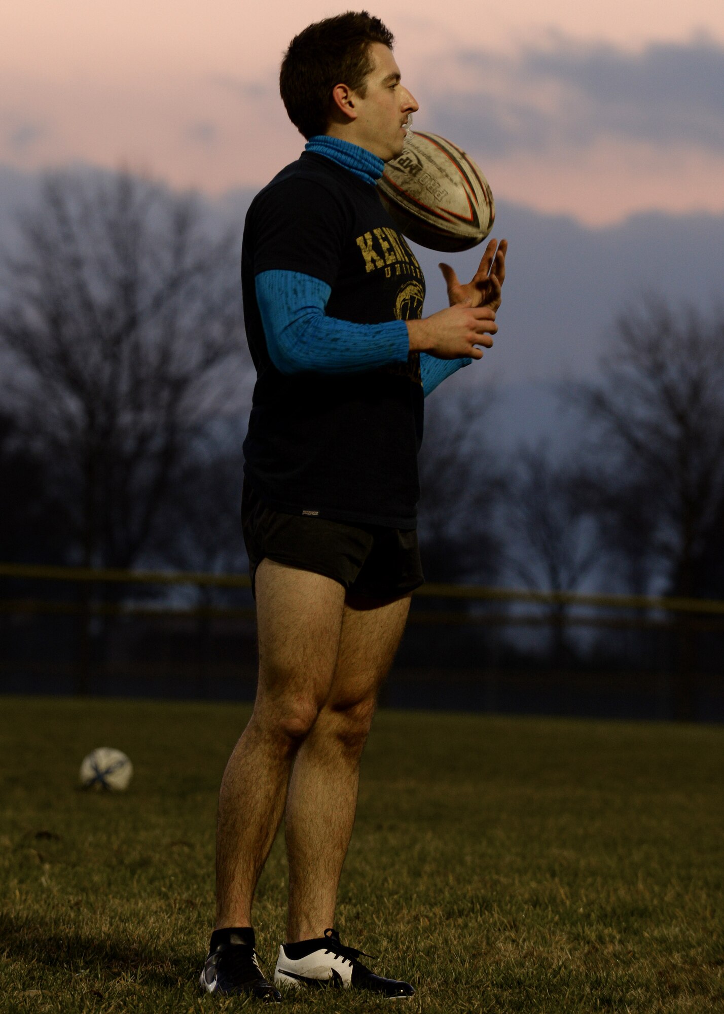 U.S. Air Force Airman 1st Class Taylor Tompkins, 31st Civil Engineer Squadron explosive ordinance disposal technician, watches his teammates run practice drills, Jan. 12, 2016, at Aviano Air Base, Italy. Practice included warm-up sprint drills, practice of offensive plays and five on five matches. (U.S. Air Force photo by Airman 1st Class Cary Smith/Released)
