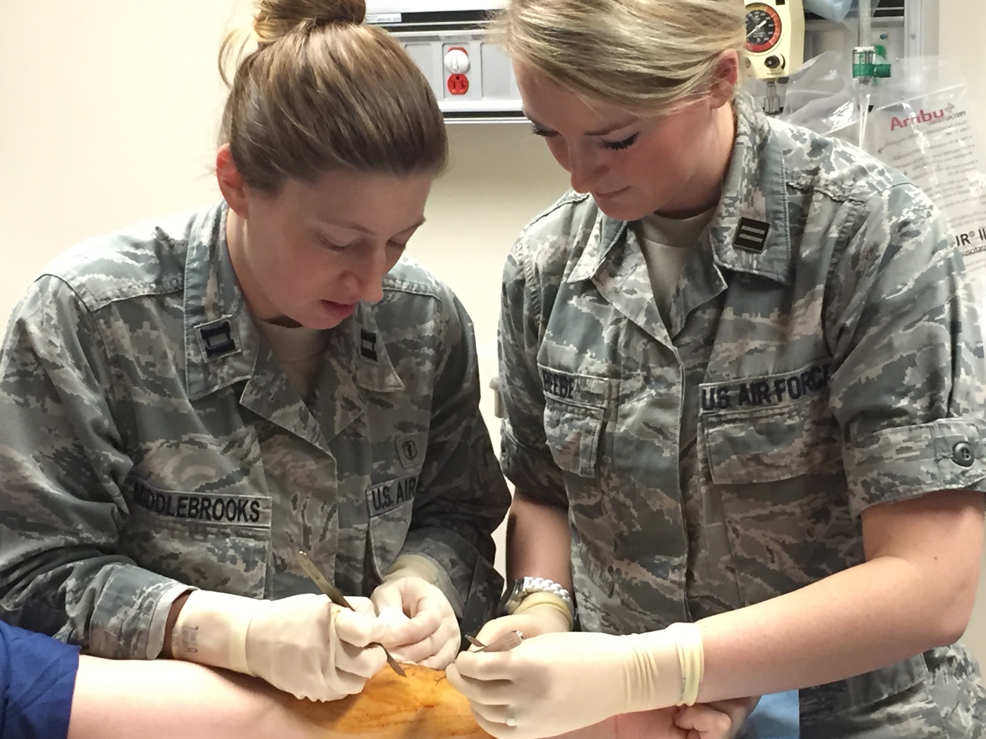 Capt. Jennifer Middlebrooks (left) and Staff Sgt. Elissa Beebe (right), both from the 60th Medical Operations Squadron, are nearing the completion of Phase 2 training as part of the Interservice Physician Assistant Program at Travis Air Force Base, California. (Courtesy photo)