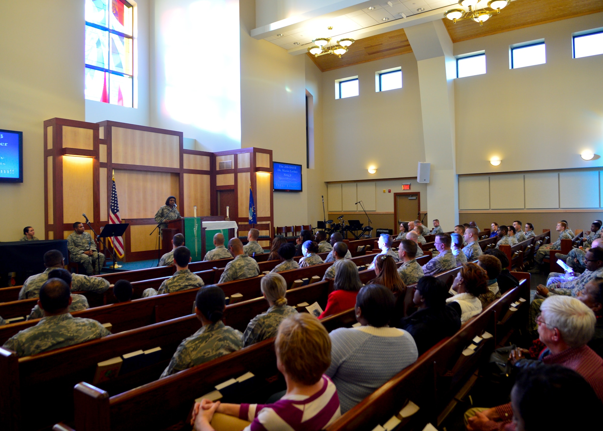 Chief Master Sgt. Erica Hammond, 436th Medical Group superintendent, speaks to attendees of the Dr. Martin Luther King, Jr. Commemorative Ceremony Jan. 14, 2016, at Chapel 1 on Dover Air Force Base, Del.  Hammond was invited to be the guest speaker and spoke about the advancements of civil rights made by Dr. King in the 1960s. (U.S. Air Force photo/Senior Airman William Johnson)
