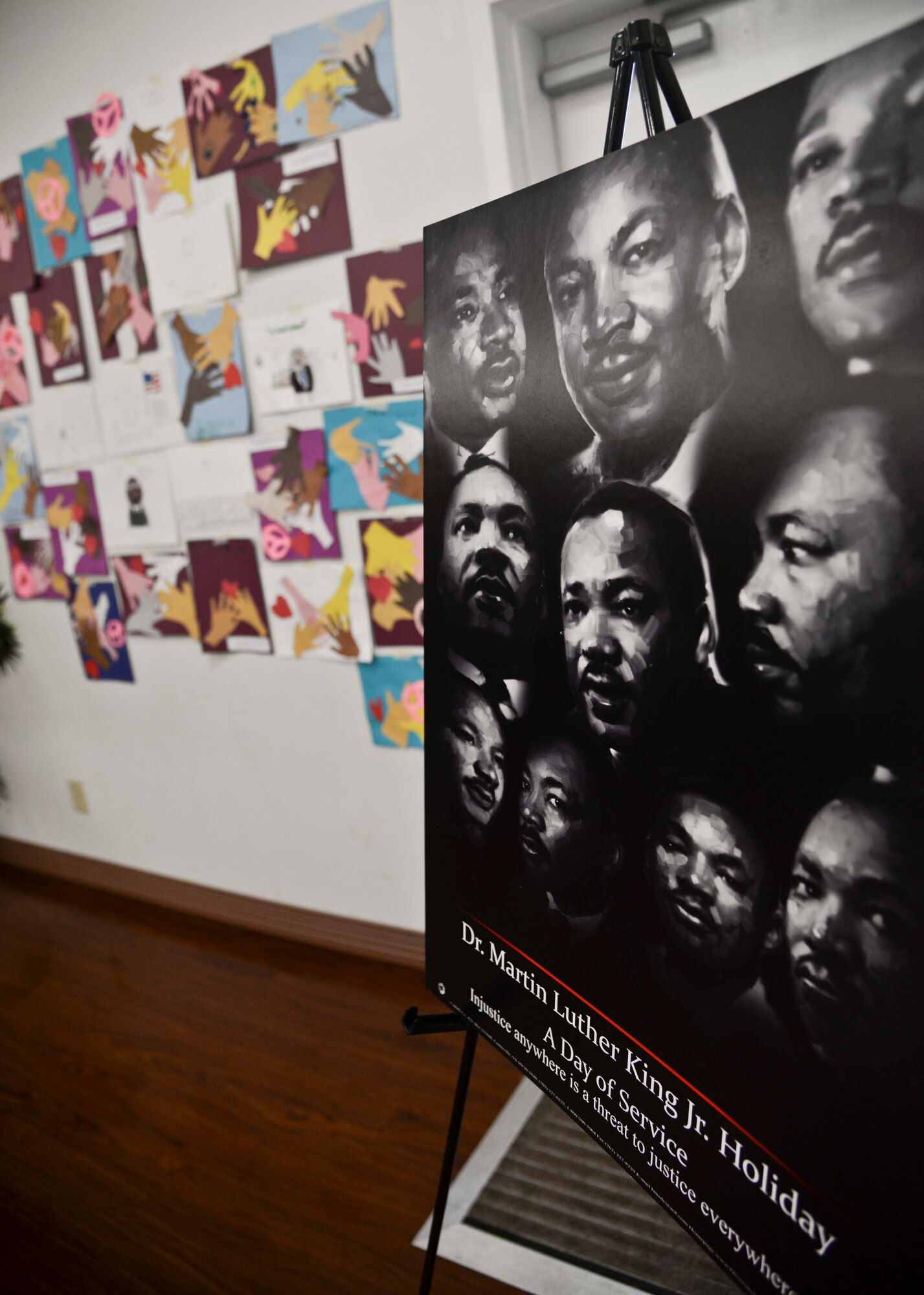 A sign for a Martin Luther King Jr. Special Observance event is displayed at MacDill Air Force Base, Fla., Jan. 15, 2015. Each year Team MacDill organizes an event to honor the late Dr. King and what he stood for. (U.S. Air Force photo by Senior Airman Vernon L. Fowler Jr.)