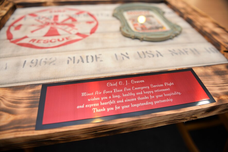 A going-away gift for C.J. Cavern, former Minot city fire chief, sits at the 5th Civil Engineer Squadron Fire Department at Minot Air Force Base, N.D., Jan. 5, 2016. Team Minot welcomes Kelli Flermoen, Minot city’s new fire chief. (U.S. Air Force photo/Airman 1st Class J.T. Armstrong)