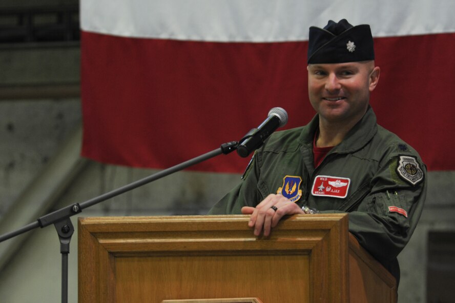 U.S. Air Force Lt. Col. David Berkland, outgoing 480th Fighter Squadron commander, speaks during a change of command ceremony at Hangar One on Spangdahlem Air Base, Germany, Jan. 15, 2016. Berkland served as commander of the 480th FS since January 2014 and concluded his remarks with the squadron’s motto: ‘First In, Last Out.’ (U.S. Air Force photo by Staff Sgt. Joe W. McFadden/Released)