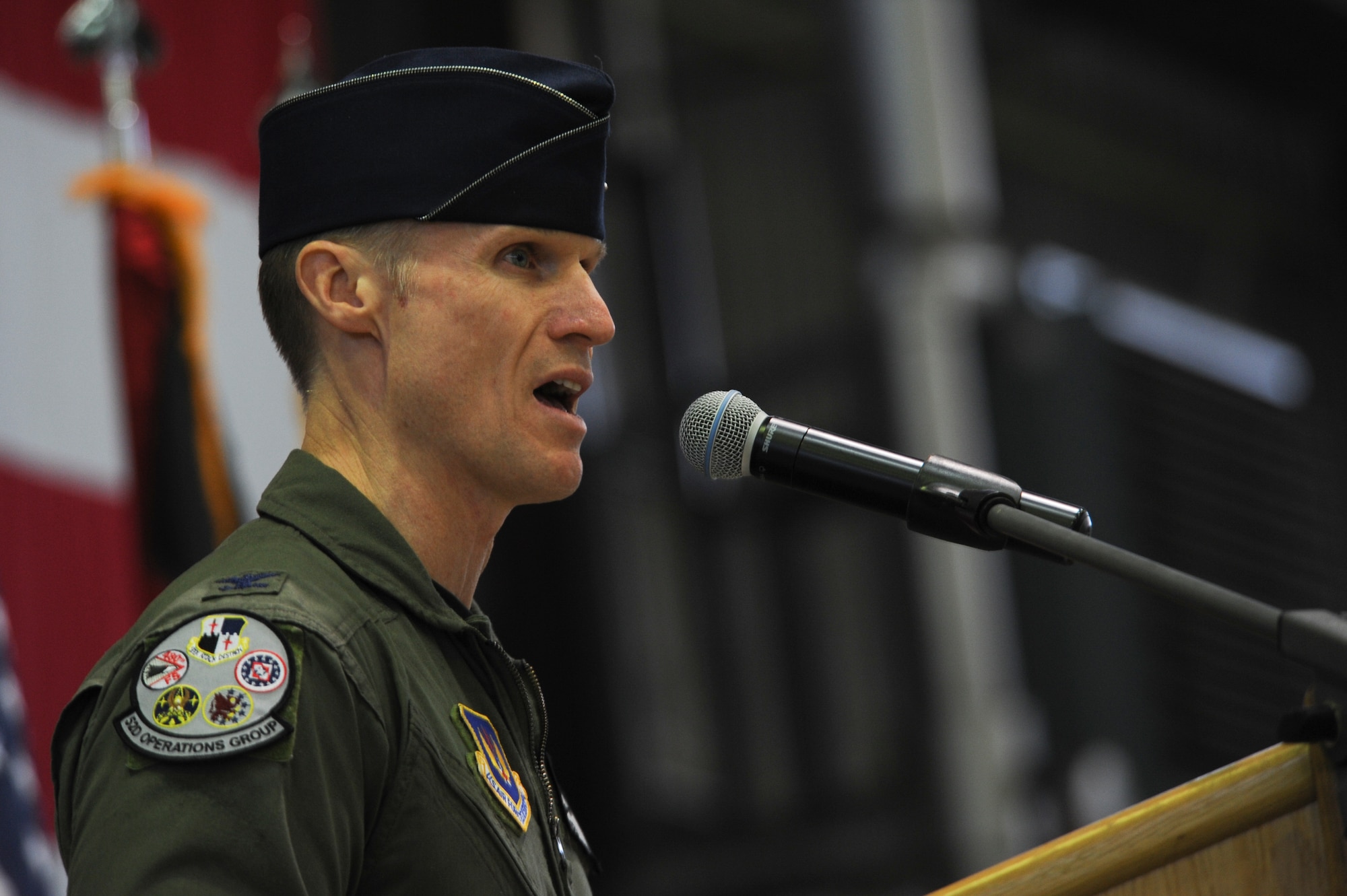 U.S. Air Force Col. Michael Thompson, 52nd Operations Group commander, speaks during a change of command ceremony at Hangar One on Spangdahlem Air Base, Germany, Jan. 15, 2016. Thompson highlighted the squadron’s performance under outgoing commander U.S. Air Force Lt. Col. David Berkland before presiding over the official transfer of squadron command to U.S. Air Force Lt. Col. Timothy Murphy. (U.S. Air Force photo by Staff Sgt. Joe W. McFadden/Released)