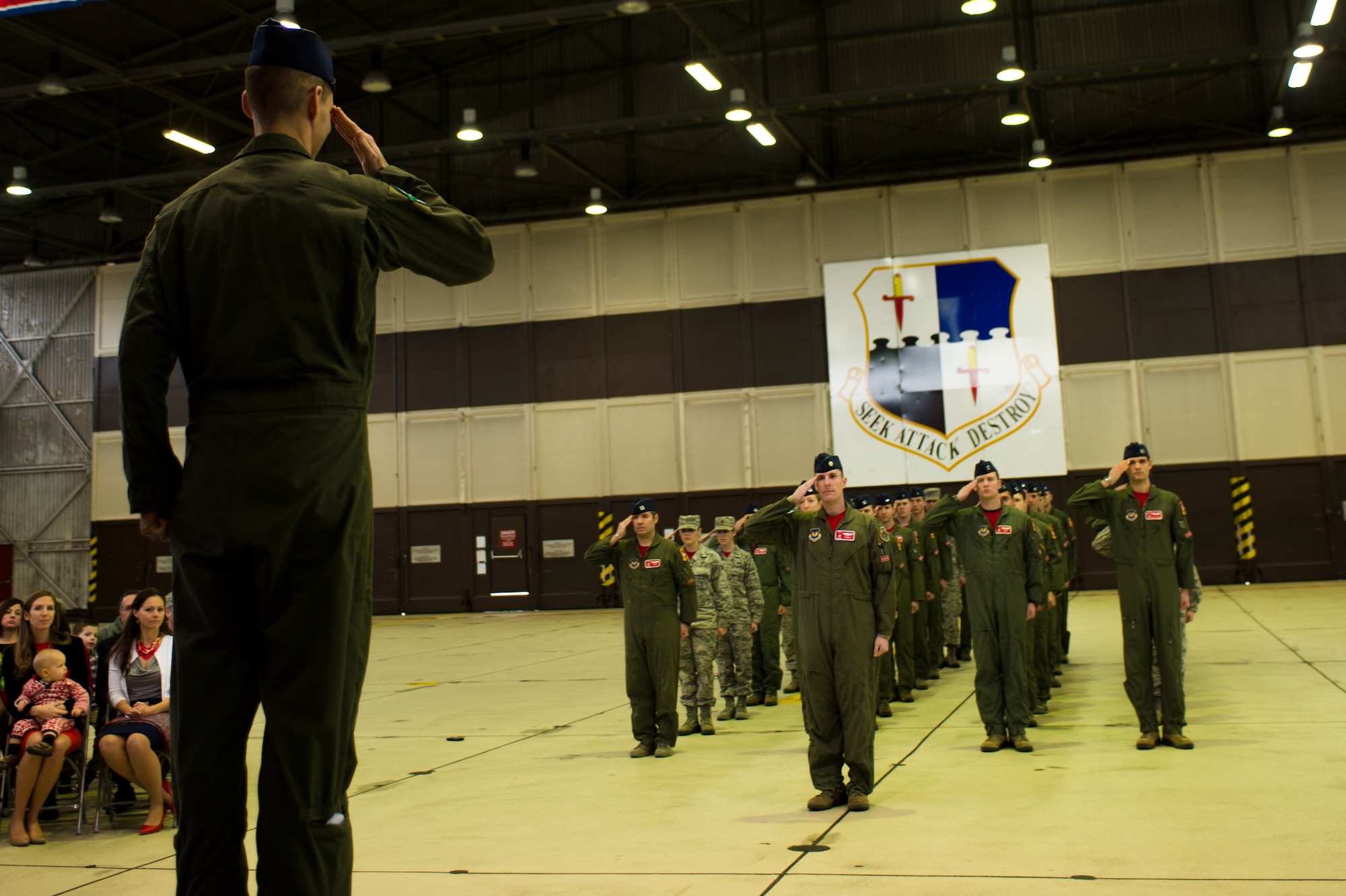 U.S. Air Force Lt. Col. Timothy Murphy, 480th Fighter Squadron commander, renders his first salute to his squadron during a change of command ceremony at Hangar One on Spangdahlem Air Base, Germany, Jan. 15, 2016. Murphy arrived at Spangdahlem after serving as the chief of safety for the 31st Fighter Wing at Aviano Air Base, Italy. (U.S. Air Force photo by Staff Sgt. Joe W. McFadden/Released)