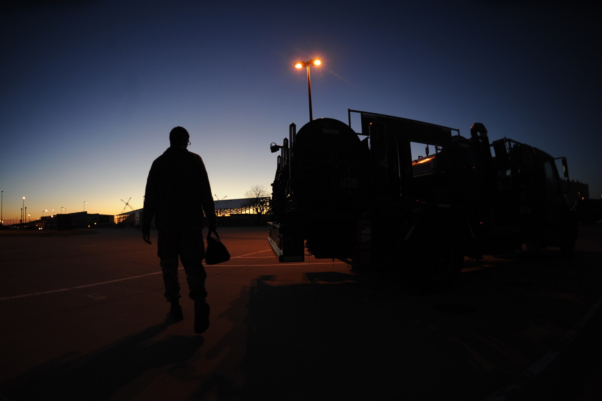 Airman 1st Class Zachary Smith, 22nd Logistics Readiness Squadron fuels distribution, inspects a vehicle for damage, Jan. 14, 2016, at McConnell Air Force Base, Kan. Fuels distribution Airmen routinely inspect the vehicle fleet to ensure they are no maintenance issues that would inhibit the aerial refueling mission.  (U.S. Air Force photo/Airman Jenna K. Caldwell)