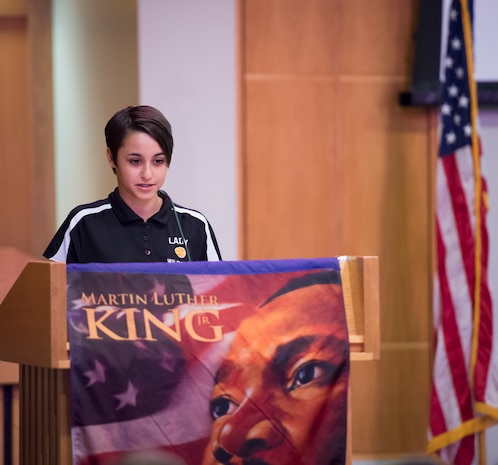 Jailee Britt, daughter of Master Sgt. Jamie Britt, 437th Operations Squadron Weather flight chief, recites a speech excerpt during a Martin Luther King Jr. Day Celebration event Jan. 15, 2016, at the Chapel Annex on Joint Base Charleston – Air Base, S.C. JB Charleston’s Multicultural Committee put up the event in celebration of King’s legacy. (U.S. Air Force Photo/Senior Airman Clayton Cupit)