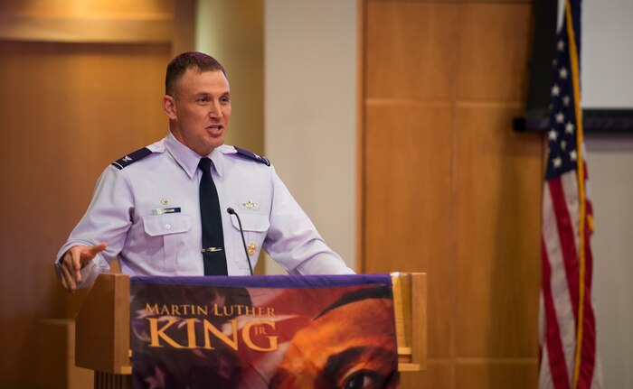 Col. John Lamontagne, 437th Airlift Wing commander, gives his opening remarks to Airmen and Sailors attending the Martin Luther King Jr. Day Celebration event Jan. 15, 2016, at the Chapel Annex on Joint Base Charleston – Air Base, S.C. JB Charleston’s Multicultural Committee put up the event in celebration of King’s legacy. (U.S. Air Force Photo/Senior Airman Clayton Cupit)
