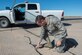 U.S. Air Force Senior Airman Fidencilio Velasquez, 7th Operations Support Squadron airfield manager operation coordinator, checks a crack on the runway Jan. 12, 2016, at Dyess Air Force Base, Texas. When a crack is formed in the pavement, the crack is filled with joint sealant to prevent the pavement from cracking more and potentially damaging an aircraft’s tire.  (U.S. Air Force photo by Airman 1st Class Austin Mayfield/Released)