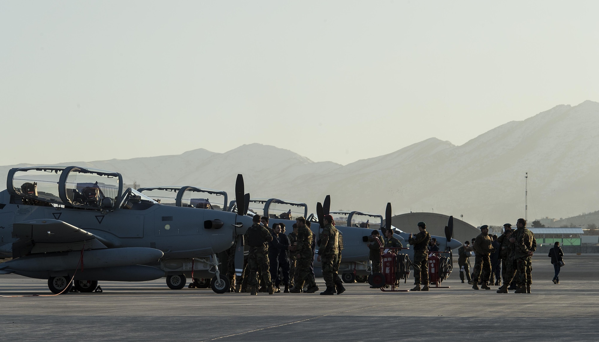 Four A-29 Super Tucanos arrive at Hamid Karzai International Airport, Afghanistan, Jan. 15, 2016. The aircraft will be added to the Afghans' inventory in the spring of 2016. The A-29 Super Tucano is a 'light air support' aircraft capable of conducting close air support, aerial escort, armed overwatch and aerial interdiction. Designed to operate in high temperature and in extremely rugged terrain, the A-29 Super Tucano is highly maneuverable 4th generation weapons system capable of delivering precision guided munitions. It can fly at low speeds and low altitudes, is easy to fly, and provides exceptionally accurate weapons delivery. It is currently in service with 10 different air forces around the world. (U.S. Air Force photo by Tech. Sgt. Nathan Lipscomb)