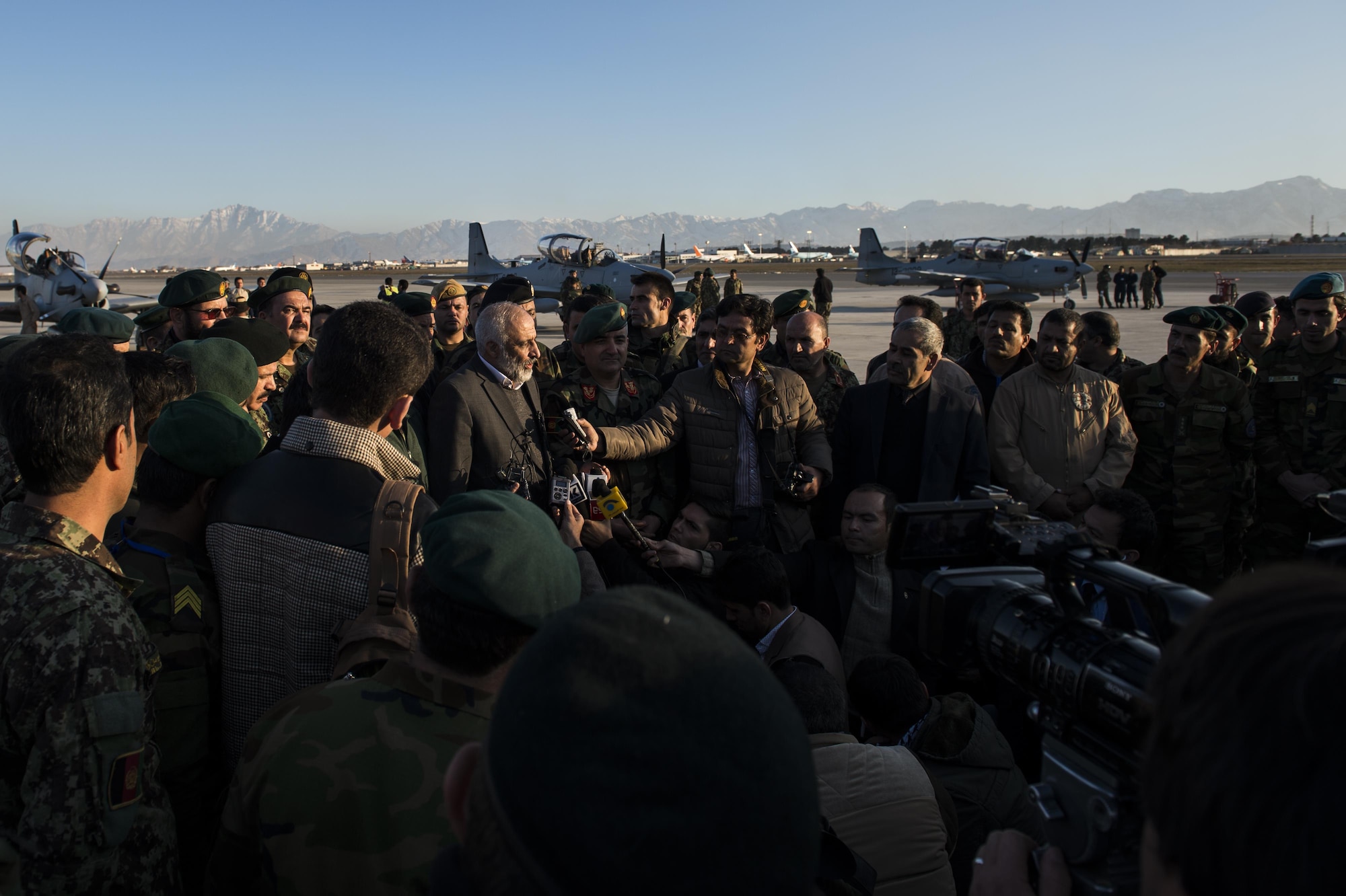 The Minister of Defense for Afghanistan, Mohammad Massom, addresses members of the Afghan air force and Afghan national media after the delivery of four A-29 Super Tucanos to the Afghan air force at Hamid Karzai International Airport, Afghanistan, Jan. 15, 2016. The A-29 Super Tucano is a 'light air support' aircraft capable of conducting close air support, aerial escort, armed overwatch and aerial interdiction. Designed to operate in high temperature and in extremely rugged terrain, the A-29 Super Tucano is highly maneuverable 4th generation weapons system capable of delivering precision guided munitions. It can fly at low speeds and low altitudes, is easy to fly, and provides exceptionally accurate weapons delivery. It is currently in service with 10 different air forces around the world. (U.S. Air Force photo by Tech. Sgt. Nathan Lipscomb)
