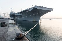 (Jan. 10, 2016) Aircraft carrier USS Harry S. Truman (CVN 75) is moored to a pier in Jebel Ali displaying gold anchors recognizing Truman as a recipient of the 2015 Retention Excellence Award. Harry S. Truman Carrier Strike Group is deployed in support of Operation Inherent Resolve, maritime security operations, and theater security cooperation efforts in the U.S. 5th Fleet area of operations. (U.S. Navy photo by Mass Communication Specialist 2nd Class Karl Anderson/Released)