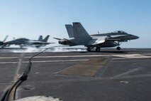 (Jan. 14, 2016) An F/A-18C Hornet, assigned to the "Rampagers" of Strike Fighter Squadron (VFA) 83, lands on the flight deck of aircraft carrier USS Harry S. Truman (CVN 75). Harry S. Truman Carrier Strike Group is deployed in support of Operation Inherent Resolve, maritime security operations, and theater security cooperation efforts in the U.S. 5th Fleet area of operations.