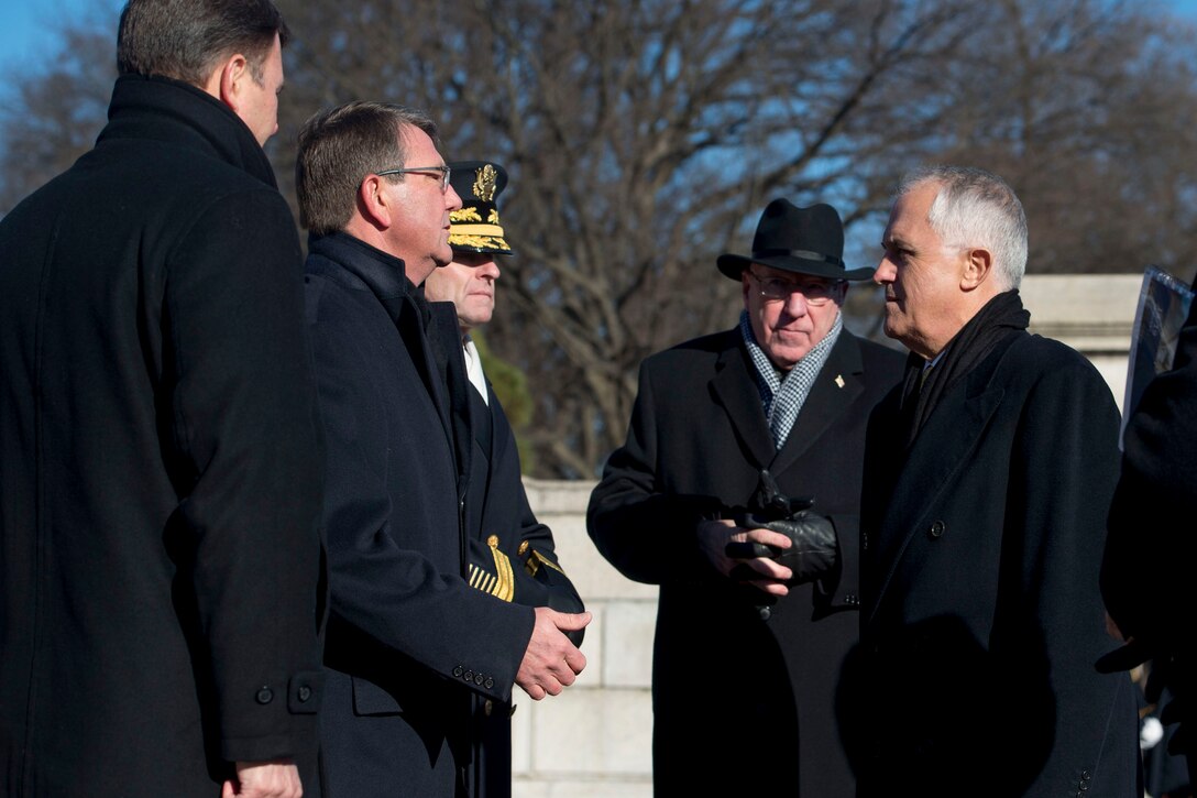 Defense Secretary Ash Carter welcomes Australian Prime Minister Malcolm Turnbull to Arlington National Cemetery, Arlington, Va., to participate in a wreath-laying ceremony at the Tomb of the Unknown Soldier, Jan. 18, 2016.  DoD photo by Senior Master Sgt. Adrian Cadiz