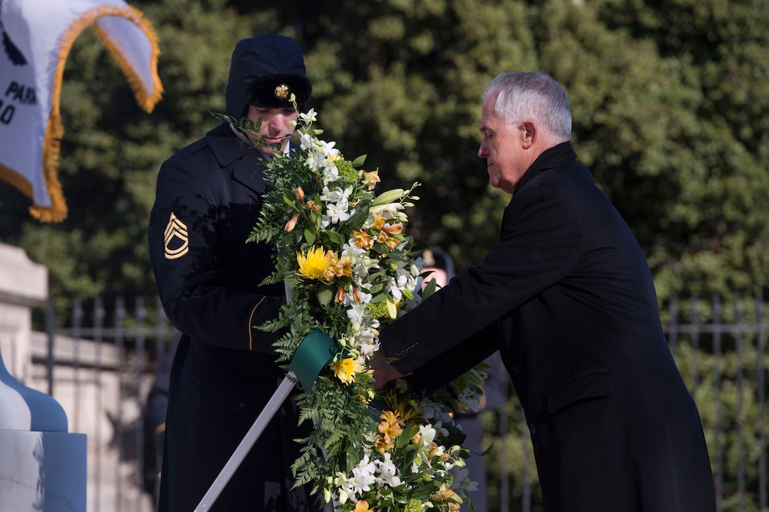 Australian Prime Minister Malcolm Turnbull places a wreath at the Tomb of the Unknown Soldier at Arlington National Cemetery, Arlington, Va., Jan. 18, 2016.  DoD photo by Senior Master Sgt. Adrian Cadiz 