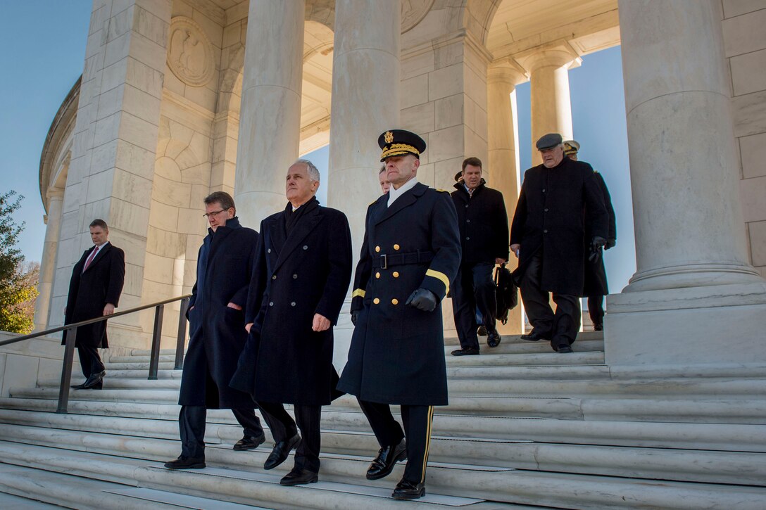 Defense Secretary Ash Carter and Australian Prime Minister Malcolm Turnbull leave the Arlington National Cemetery Amphitheater after participating in a wreath-laying ceremony at the Tomb of the Unknown Soldier at Arlington National Cemetery, Arlington, Va., Jan. 18, 2016. DoD photo by Senior Master Sgt. Adrian Cadiz