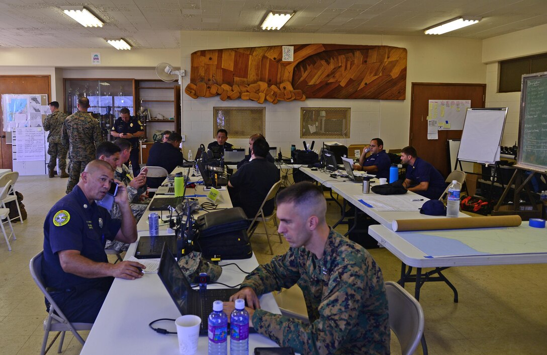 Multiple federal, state and local agencies are coordinating search and rescue efforts from the Haleiwa Incident Command Post in Haleiwa, Hawaii, Jan. 17, 2016. The search and rescue efforts are for 12 missing Marines who were involved in a helicopter crash along the North Shore of Oahu. (U.S. Coast Guard photo by Petty Officer 1st Class Levi Read/Released)