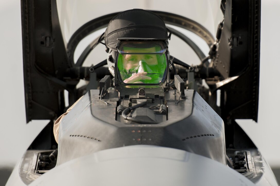 Air Force 1st Lt. Matthew Sanders prepares for a combat sortie in an F-16 Fighting Falcon aircraft on Bagram Airfield, Afghanistan, Jan. 17, 2016. U.S. Air Force photo by Tech. Sgt. Robert Cloys