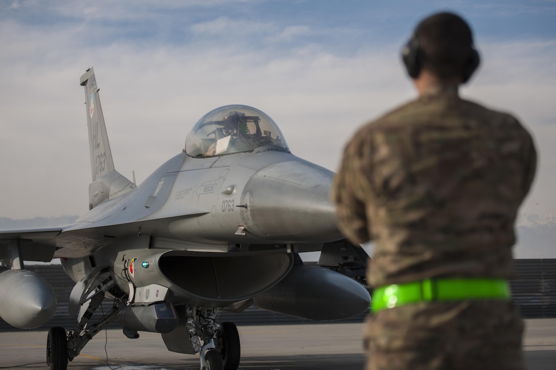 Air Force 1st Lt. Matthew Sanders prepares to depart for a combat sortie in an F-16 Fighting Falcon aircraft on Bagram Airfield, Afghanistan, Jan. 17, 2016. U.S. Air Force photo by Tech. Sgt. Robert Cloys