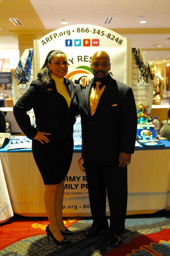 Maritza Ramirez, 79th Sustainment Support Command's family programs director and W.K. Jones, chief of the 63rd Regional Support Command Wellbeing Division pose for a picture at the 63rd RSC's Yellow Ribbon Event on Jan. 16, 2016, in Dallas.