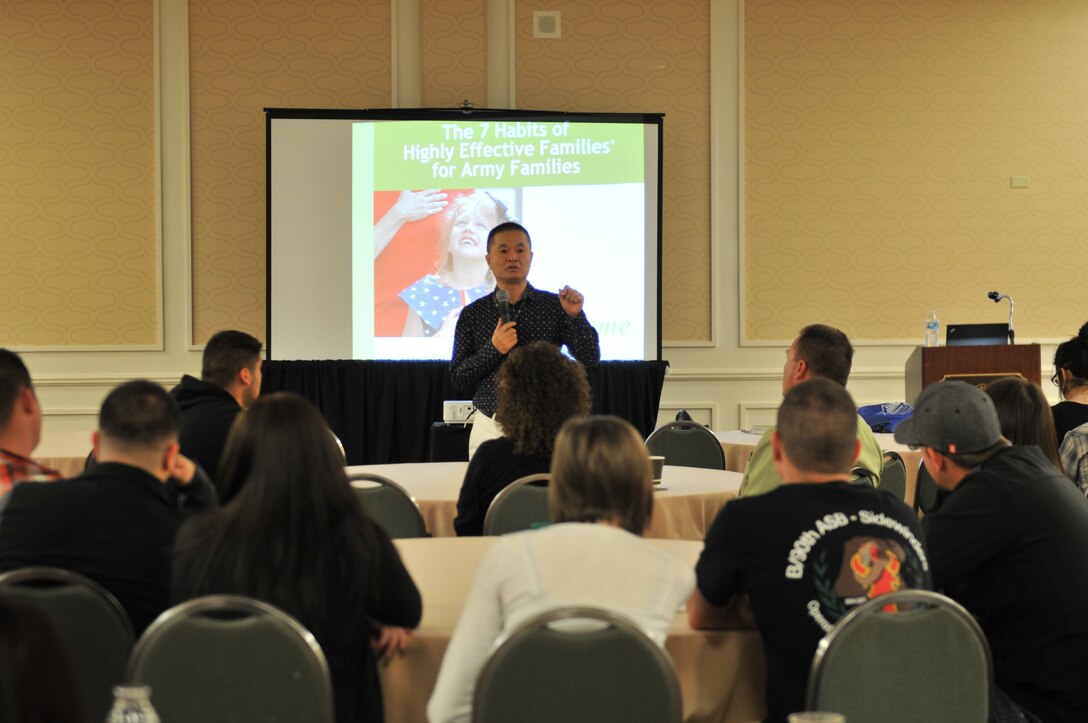 Chaplain Sung Kim of the 63rd Regional Support Command teaches a resiliency class for married couples at the Yellow Ribbon event in Dallas Jan. 17, 2016.